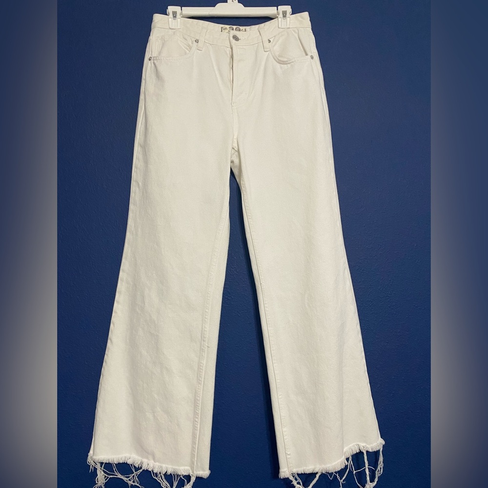 “We the Free” white jeans with blue floral lining - super cute!